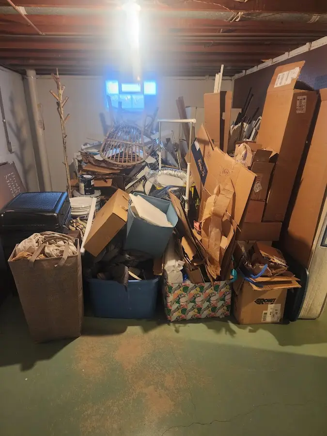 Roll-off dumpster container at job site for Roll Off Dumpster Rental in Booneville